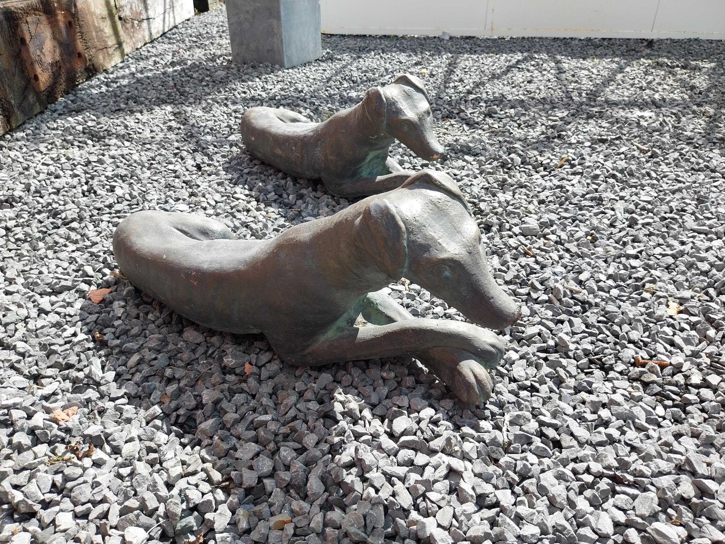 Pair of painted moulded terracotta statues of recumbent Whippets {24 cm H x 60 cm W x 19 cm D}. - Image 2 of 7