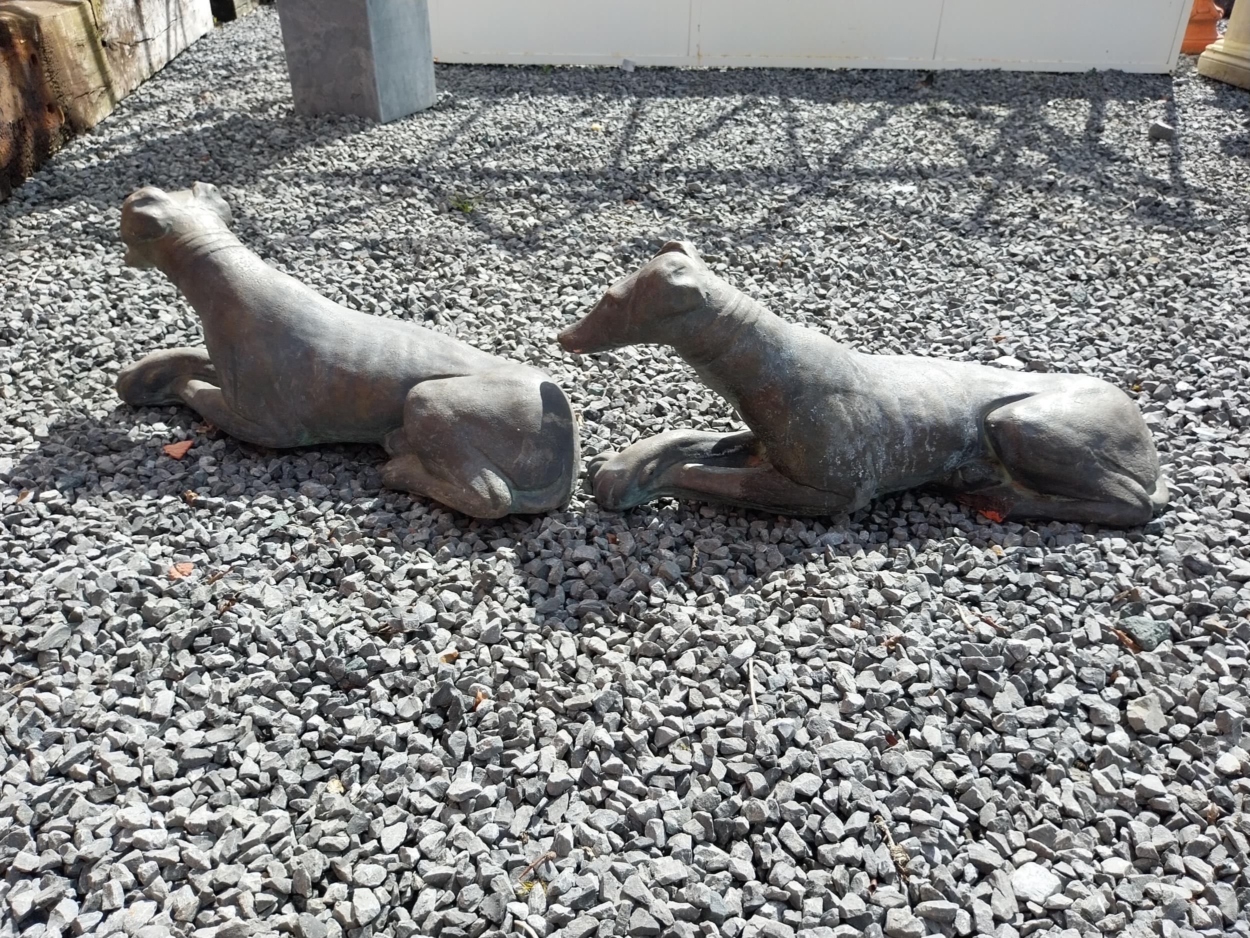 Pair of painted moulded terracotta statues of recumbent Whippets {24 cm H x 60 cm W x 19 cm D}. - Image 5 of 7