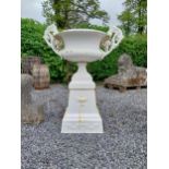 Decorative French cast iron urn raised on pedestal {109 cm H x 86 cm W x 60 cm D}. (NOT AVAILABLE TO