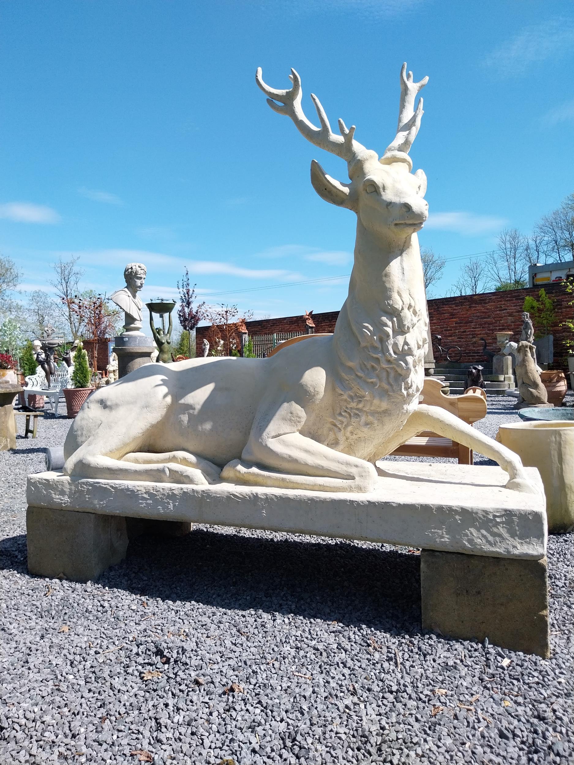 Good quality moulded sandstone life-size statue of a Stag mounted in plinth {190 cm H x 204 cm W x