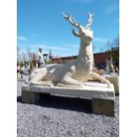 Good quality moulded sandstone life-size statue of a Stag mounted in plinth {190 cm H x 204 cm W x