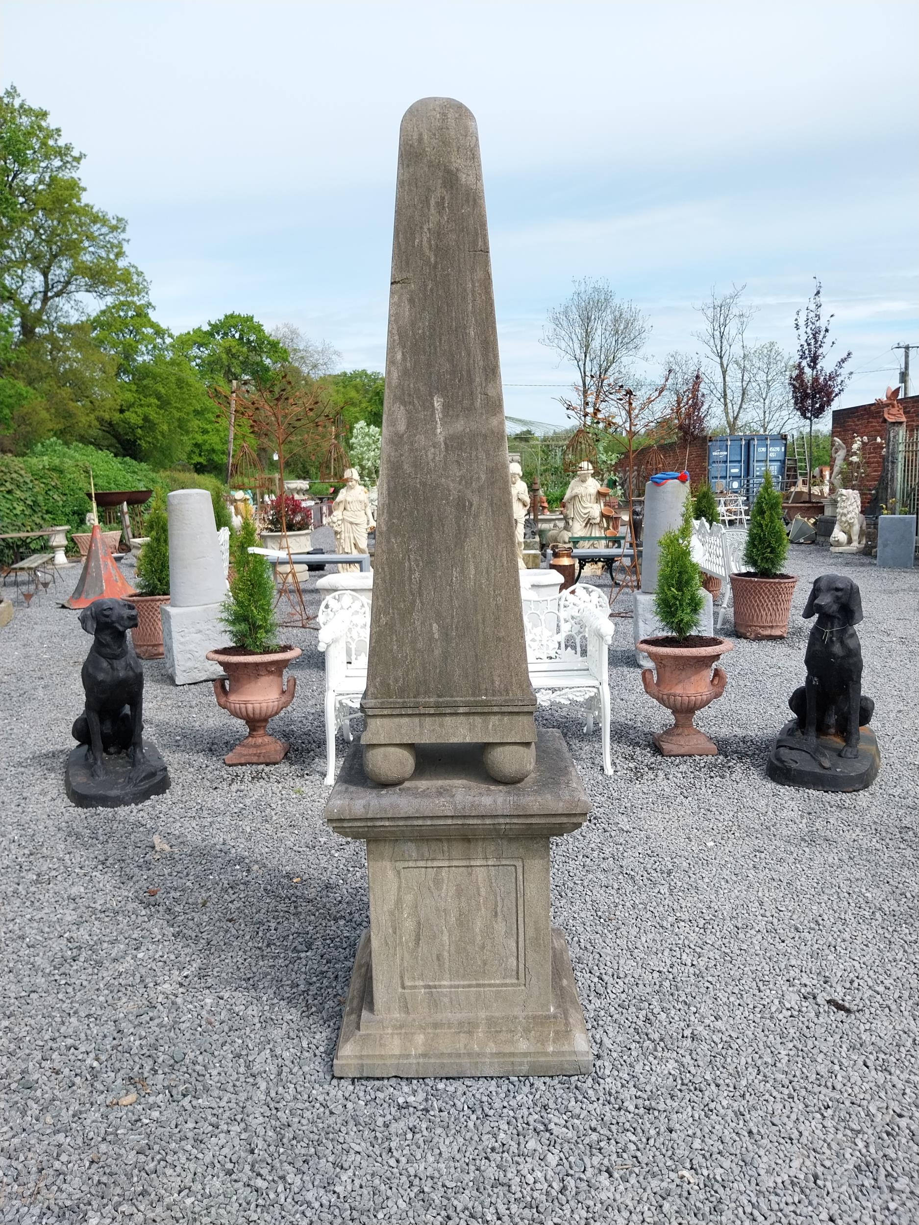 Good quality hand carved limestone obelisk raised on pedestal {220 cm H x 60 cm x 60 cm D}.