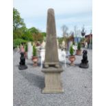 Good quality hand carved limestone obelisk raised on pedestal {220 cm H x 60 cm x 60 cm D}.