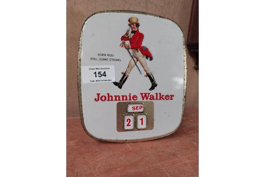 Johnnie Walker Born 1820 - Still Going Strong tin plate advertising calender. {27cm H X 24cm W}. - Image 2 of 7