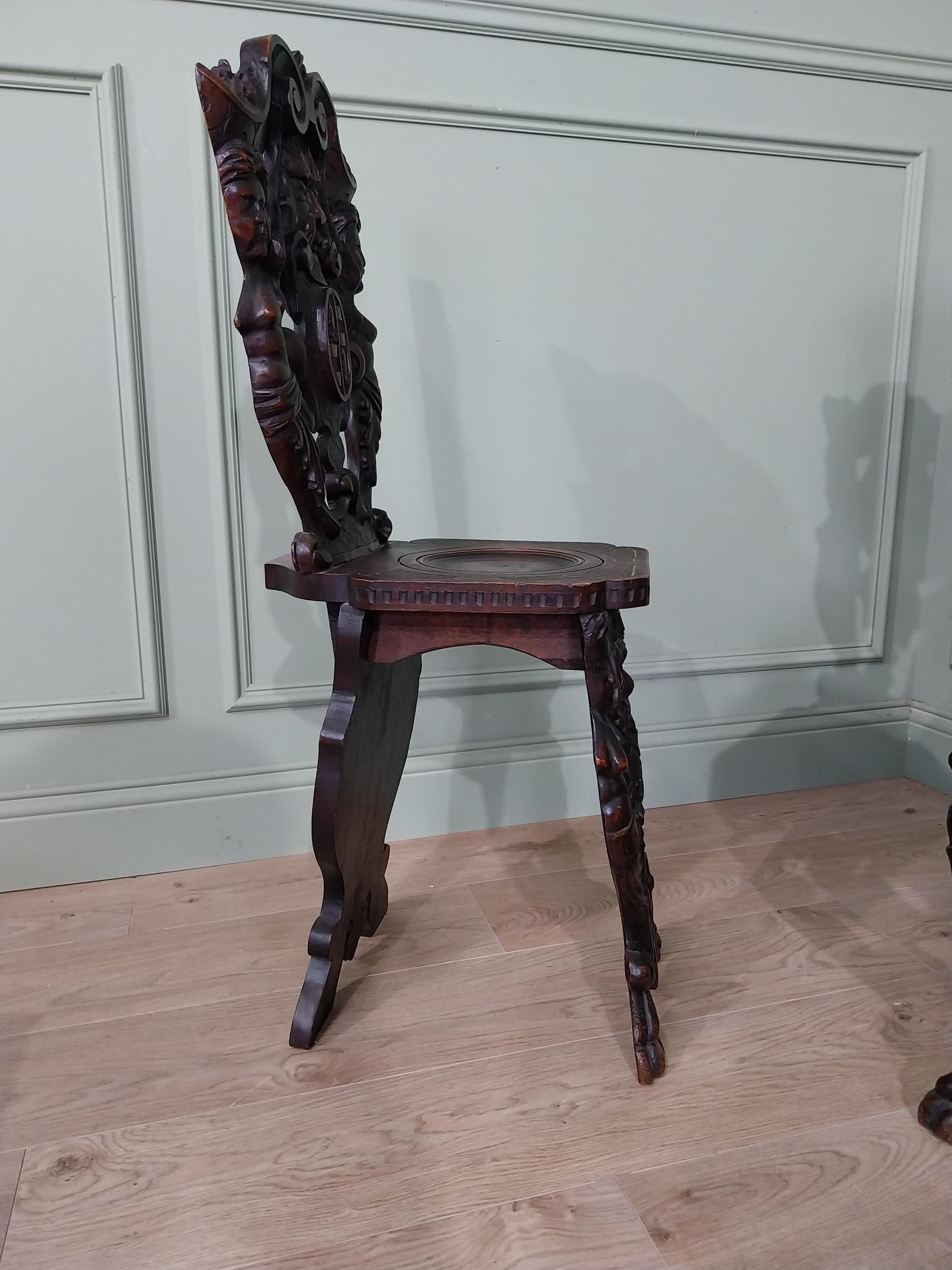 Pair of 19th C. carved walnut armorial hall chairs {100 cm H x 40 cm W x 40 cm D}. - Image 12 of 13