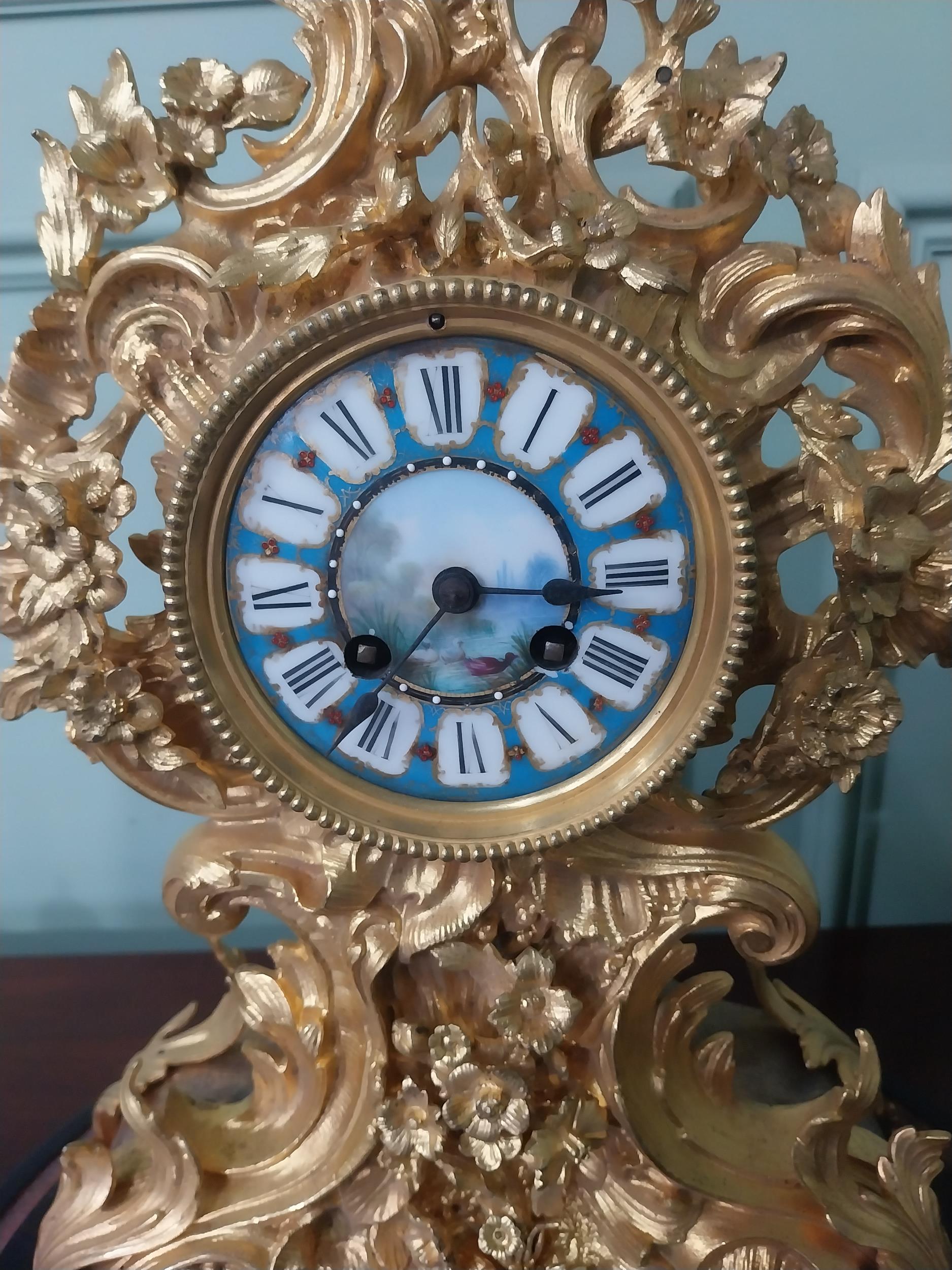 Exceptional quality 19th C. French gilded bronze mantle clock with blue and white enamel dial in the - Image 7 of 12