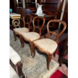 Set of three 19th C. carved walnut and upholstered side chairs raised on cabriole legs {86cm H x