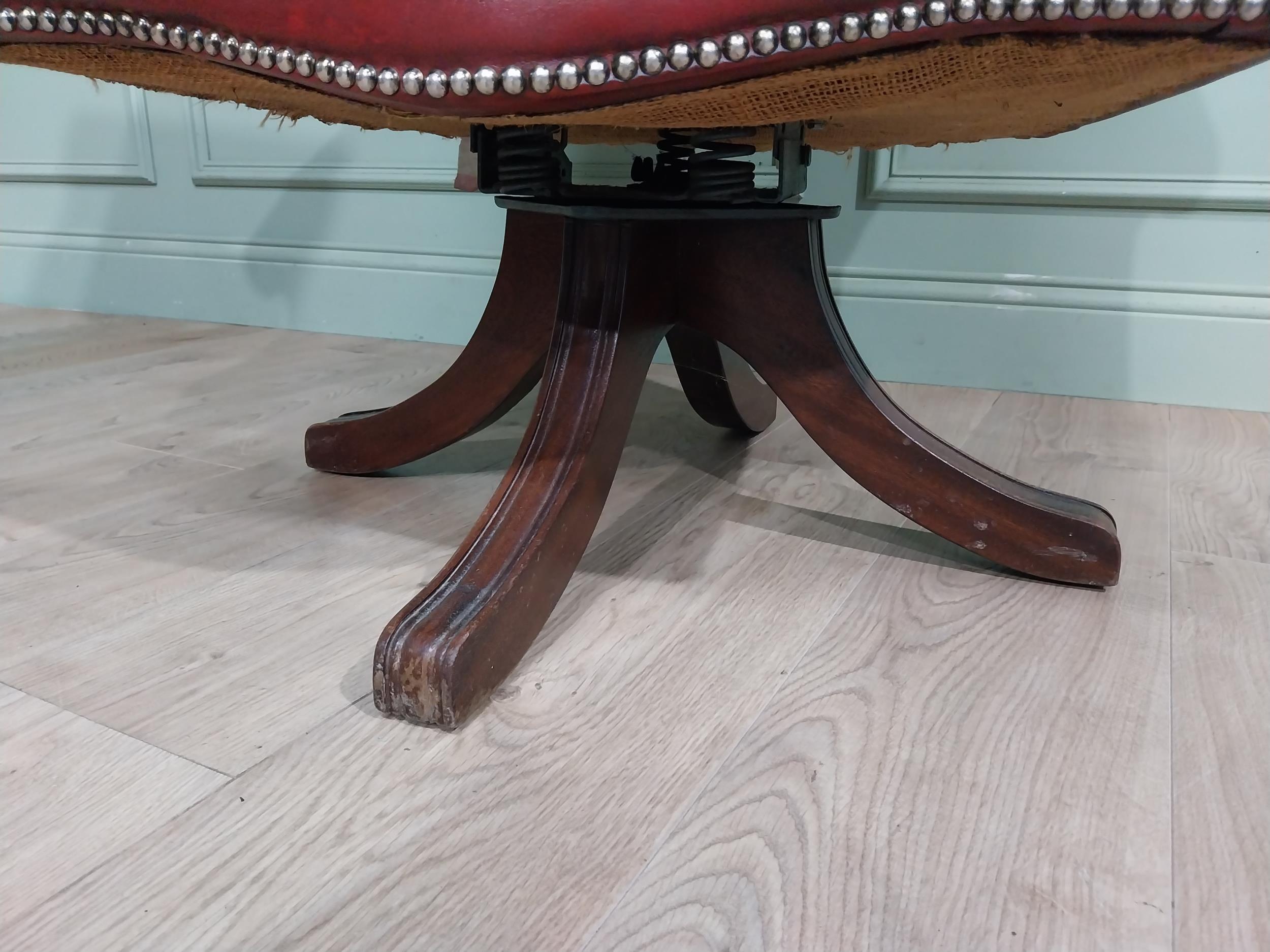 Good quality hand dyed French oxblood leather deep buttoned swivel office chair raised on four - Image 9 of 14