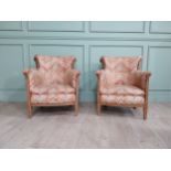 Pair of Edwardian satinwood and upholstered armchairs with stud detail raised on tapered legs. {83