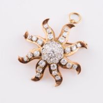 14k Yellow And White Gold Sunburst Brooch/Pendant, set with 34 various old cut diamonds (approx. 1.3