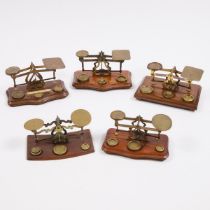 Five Victorian Brass and Mahogany Postal Scales, 19th century, largest base 4.7 x 7.7 in — 12 x 19.5