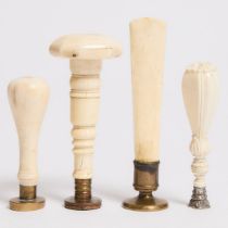 Four Victorian Ivory and Bone Desk Seals, 19th century, tallest height 3.5 in — 9 cm