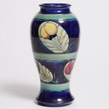 Moorcroft Banded Wisteria and Peacock Feather Vase, c.1930, height 9.1 in — 23 cm