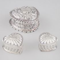 Three Late Victorian Silver Heart Shaped Boxes, William Comyns, Charles Henry Dumenil, and William G