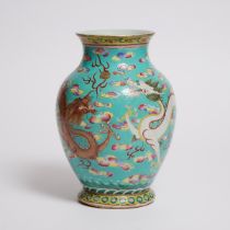 A Turquoise-Ground Famille Rose 'Dragon' Vase, 19th Century, 清 十九世纪 松石绿地粉彩龙纹瓶, height 11.3 in — 28.6