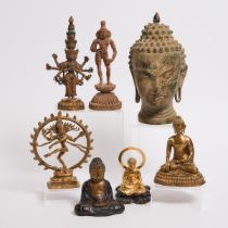 A Group of Seven Buddhist and Hindu Figures of Deities, tallest height 13.6 in — 34.5 cm (7 Pieces)