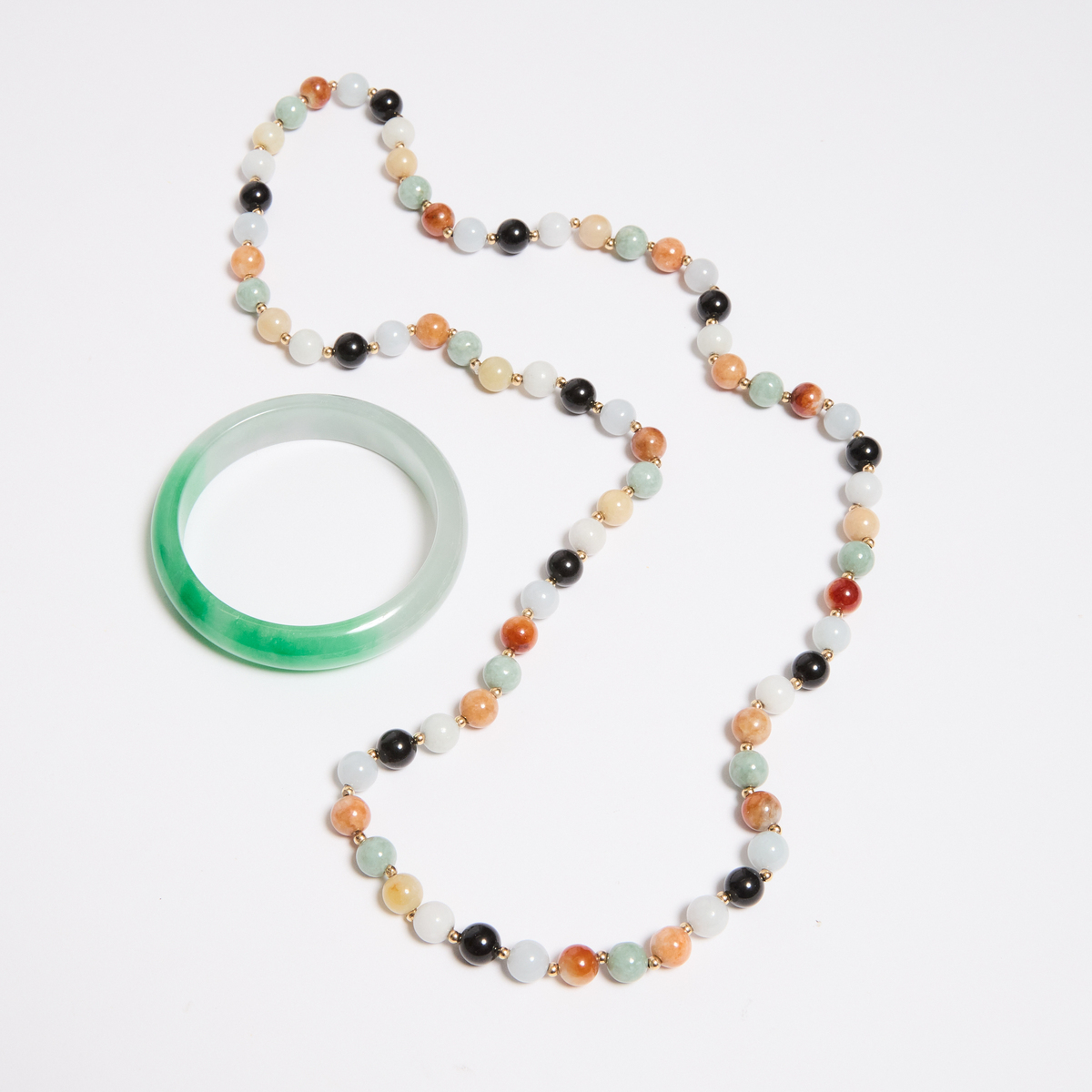 A Multicoloured Jadeite Bead Necklace With 14k Yellow Gold Spacers, Together With a Jadeite Bangle,