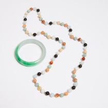 A Multicoloured Jadeite Bead Necklace With 14k Yellow Gold Spacers, Together With a Jadeite Bangle,