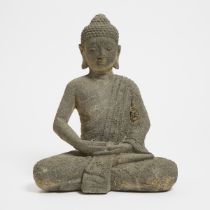 A Volcanic Stone Figure of Buddha, Java, Indonesia, height 14.6 in — 37 cm