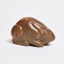 A Puddingstone Figure of a Rabbit, Tang Dynasty (618-907), 唐 布丁石雕卧兔, length 5 in — 12.6 cm