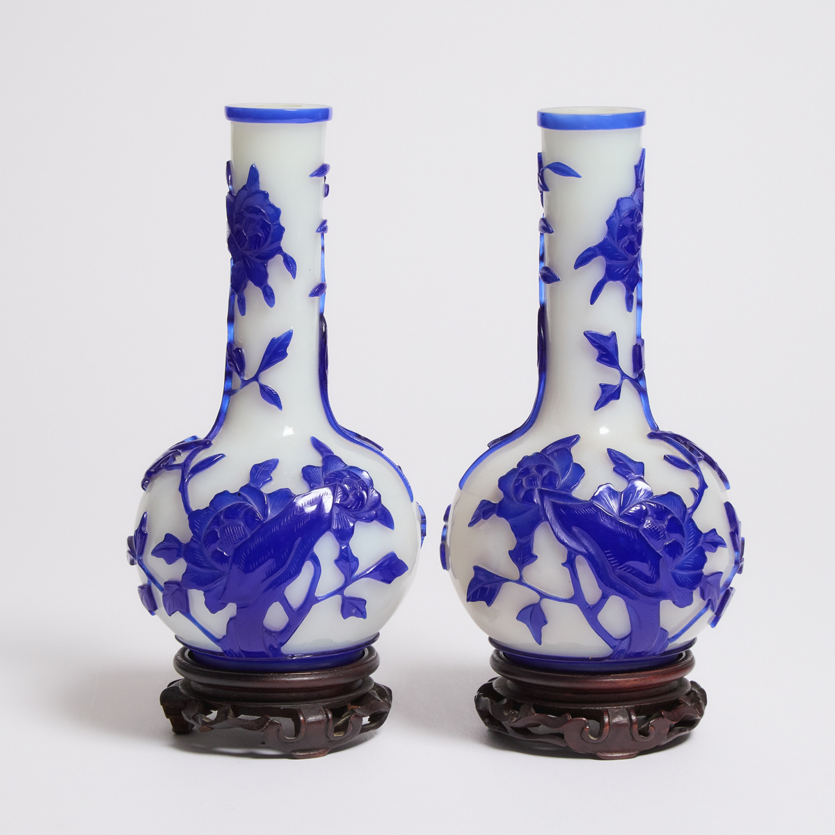 A Pair of Blue Overlay Glass 'Birds and Flowers' Bottle Vases, 20th Century, 二十世纪 涅白地套蓝料花鸟纹瓶一对, vase