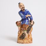 A Chinese Enameled Porcelain Figure of a Fisherman, Made by Master Zhu Tianbao, Republican Period (1