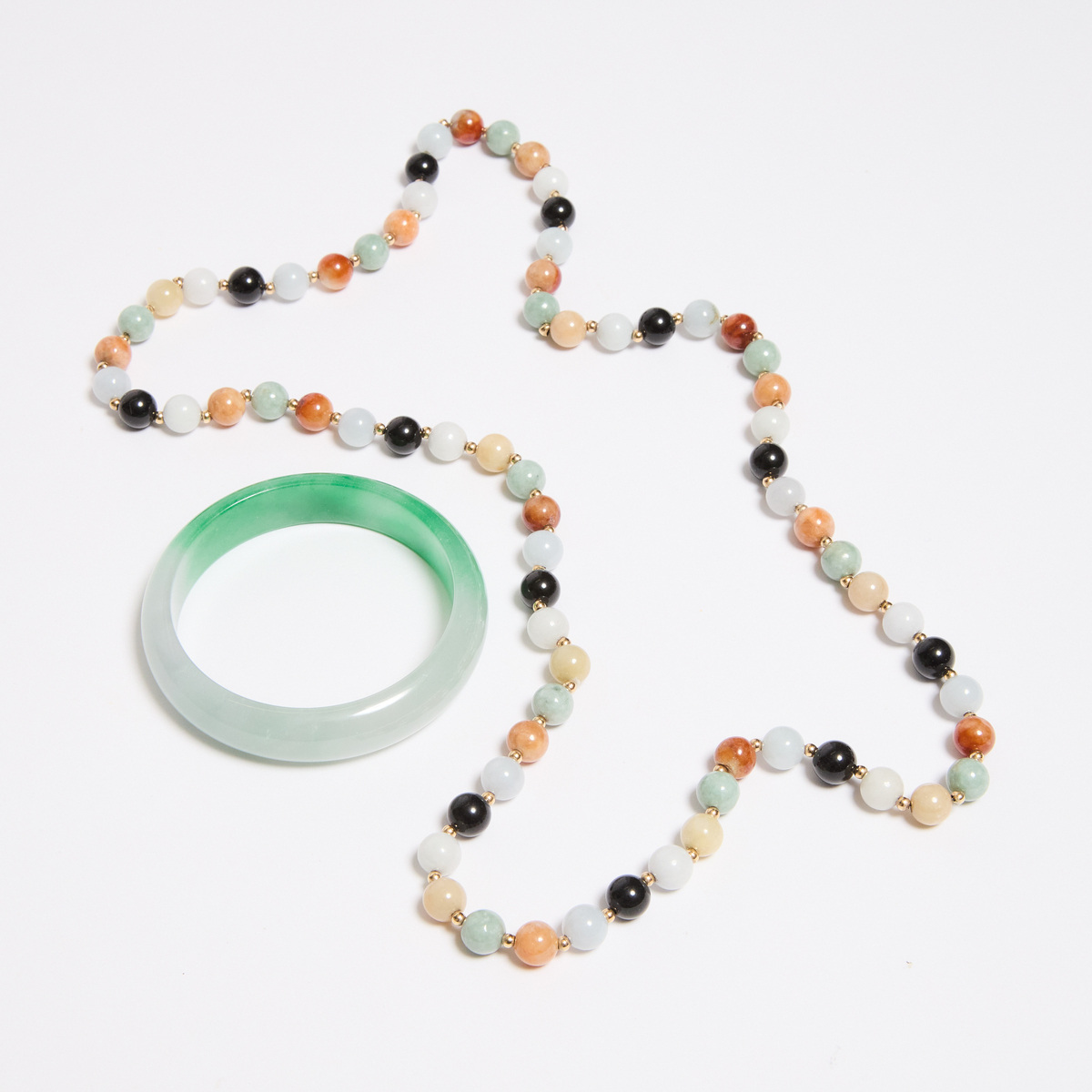 A Multicoloured Jadeite Bead Necklace With 14k Yellow Gold Spacers, Together With a Jadeite Bangle, - Image 2 of 2