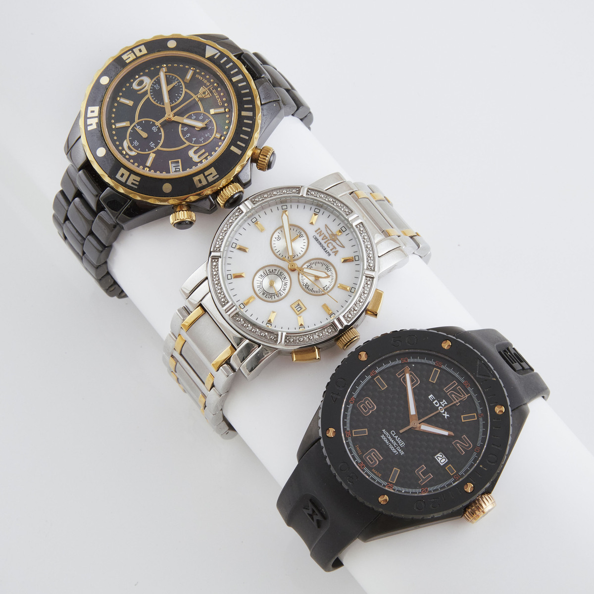 Three Large Wristwatches, the first an Invicta, with date and chronograph, #4742, 42mm, quartz movem