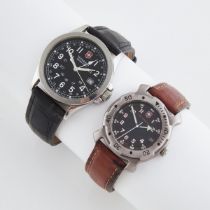 Two Victorinox 'Swiss Army' Wristwatches, 36mm & 40mm; both quartz movements, black dials, stainless
