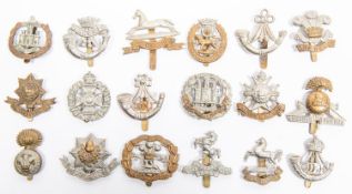 18 different Infantry cap badges, including pre 1926 King's Liverpool; pre 1925 Worcestershire;