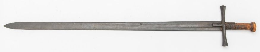 A 19th century Sudanese sword kaskara, blade 35", with 3 narrow fullers and crescent moon marks, the