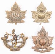 4 WWI CEF Infantry cap badges: 88th maple leaf pattern; 89th; 90th by Hicks; and 91st. GC £80-120