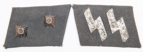A pair of Third Reich SS Latvian Volunteers collar patches to an Oberscharfuhrer, with applied metal