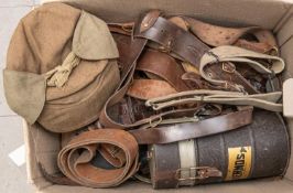 6 WWI Sam Browne belts, a leather Swedish bandolier, a WWII mountain troops cap; a military