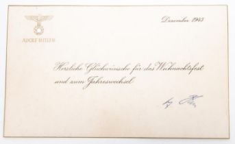 A Third Reich Christmas and New Year greeting card from Adolf Hitler, dated December 1943, with
