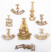 8 Territorial Infantry brass shoulder titles: "T/7/ROYAL SCOTS", "T/7/Y/RS", "T/5/ grenade/LF", "