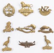 9 WWI New Zealand Reinforcements brass collar badges: 17th, pair of 22nd, 26th, 27th, 30th N.Z.