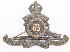 WWI Canadian CEF 63rd Overseas Field Battery Canadian Field Artillery cap badge, with two lugs.