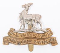 A WWI Kitchener's Army cap badge of the 1st Birmingham Bn The Royal Warwickshire Regiment. GC £80-