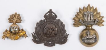 An Indian bi-metal pugaree badge of the 102nd King Edward's Own Grenadiers, with pin fitting; a