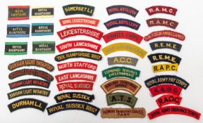 A selection of British WWII shoulder titles including Royal Hampshire variations, Durham Light