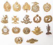 A set of New Zealand Infantry cap badges, from 1st to 17th Regiments, the majority with Gaunt