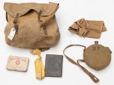 A large WWI type medical orderlies khaki cloth haversack, filled with a large quantity of dressings,