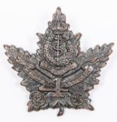 WWI CEF 4th Canadian Field Ambulance blackened cap badge.GC £80-100