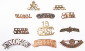 11 WWI Canadian metal shoulder titles: "2nd Depot Bn. B.C. Regt", "11th C.M.R CANADA", "1st/Canadian
