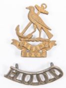 WWI Royal Naval Division Hood Bn. cap badge by Gaunt, and a single brass "HOOD" shoulder title.
