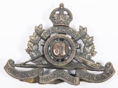 WWI Canadian CEF 61st Overseas Battery Canadian Field Artillery cap badge, with three tangs, stamped