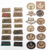 WWII British slip on titles including BEF (2), WLA (2) and other corps plus a selection of trade