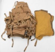 A WWII Mountain Troops Bergen rucksack, complete with straps and an early wartime groundsheet