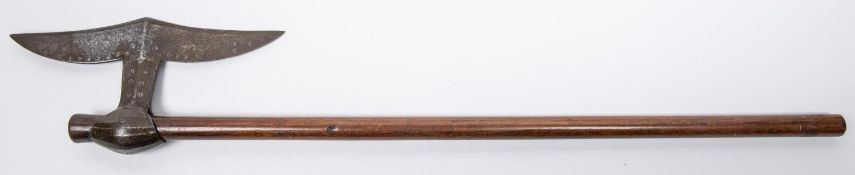 A 19th century Indian axe from Chota Nagpur, 27" overall, moustache shaped blade 9½" with simple